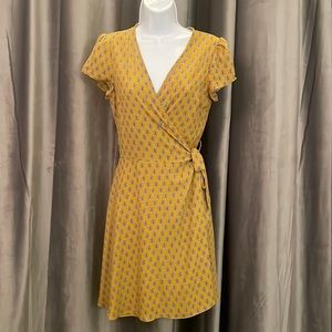 Yellow wrap dress. Size large.NWOT.